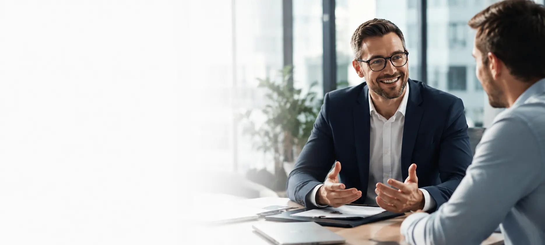 A Foundry accountant talking through figures with a client